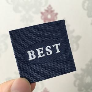 Etichetta tessuta speciale personalizzata per l'indumento